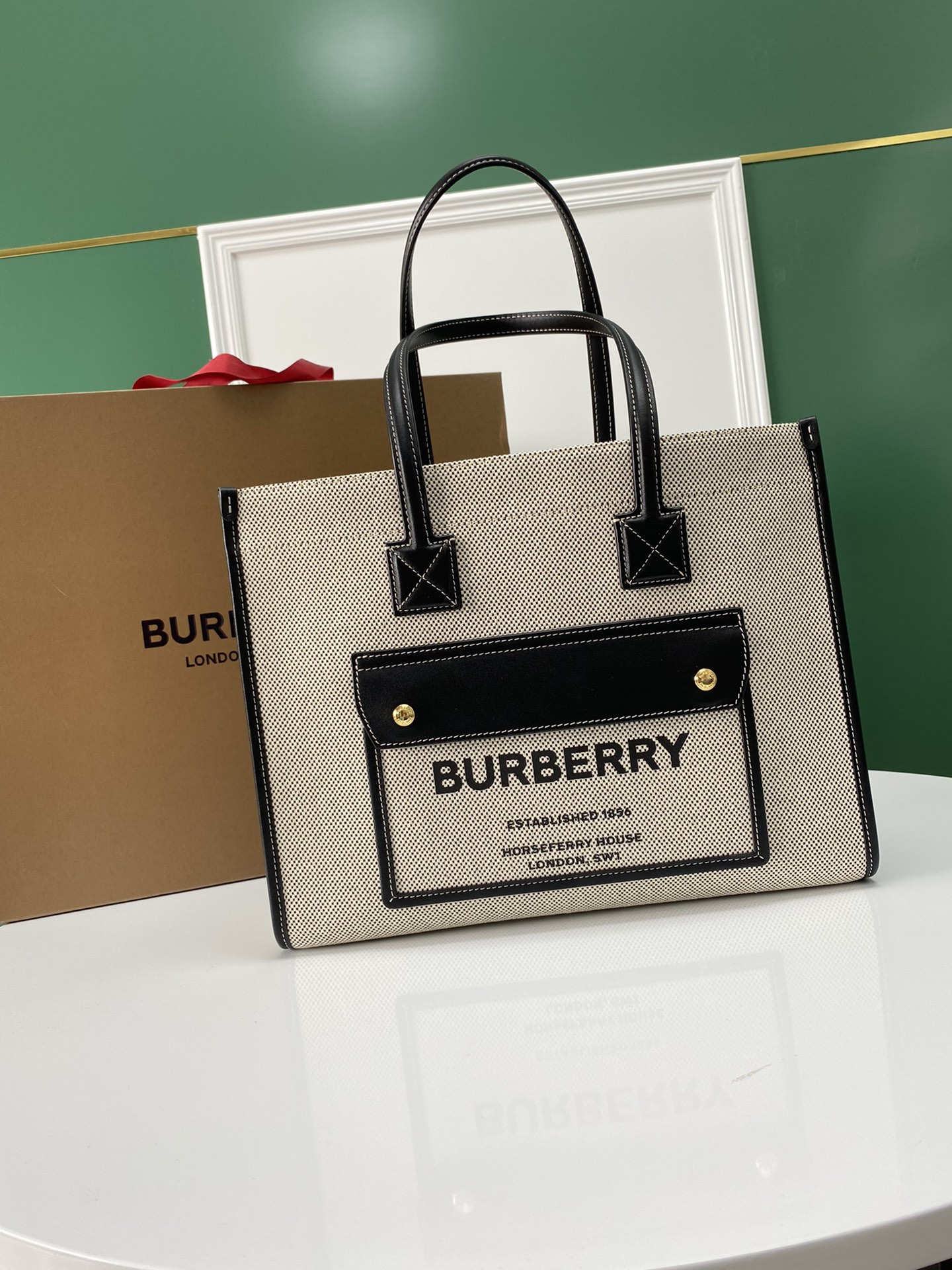 Burberrymediumfreyatoteincanvastrimmednaturalandblackjpg 11 replica designer bags online store