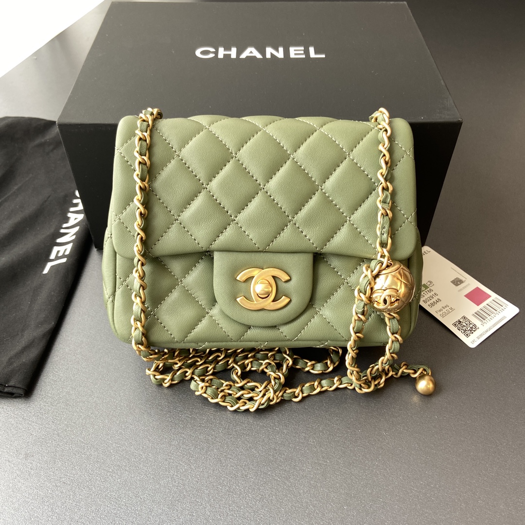 Chanelminiflapbagwithagedgoldhardwarewithquiltedcctoggleballgreenjpg 11 replica designer bags online store