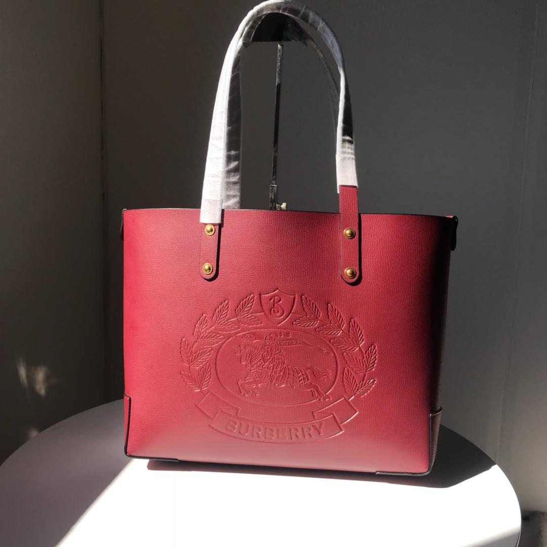 Fakeburberry40801091smallembossedcrestleatherwomentoteredjpg 11 replica designer bags online store