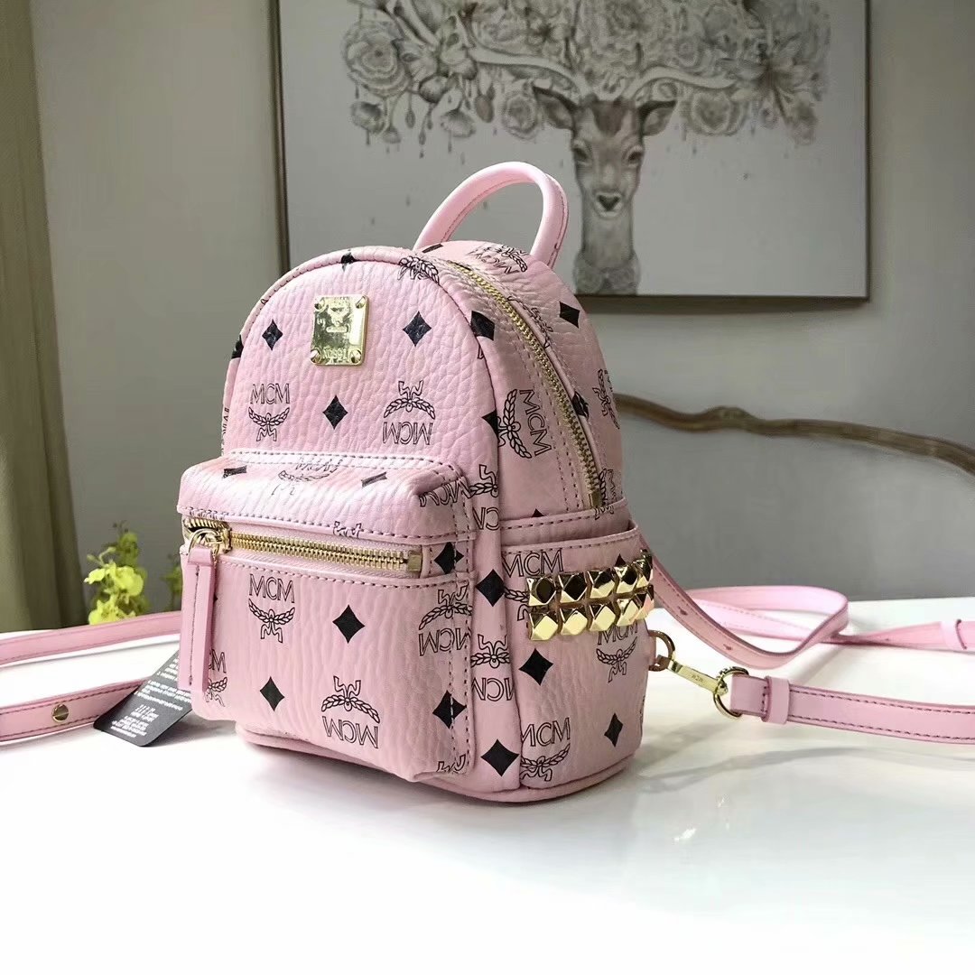 Replicamcmstarksidestudsminiwomenbackpackinvisetossoftpinkjpg 11 replica designer bags online store
